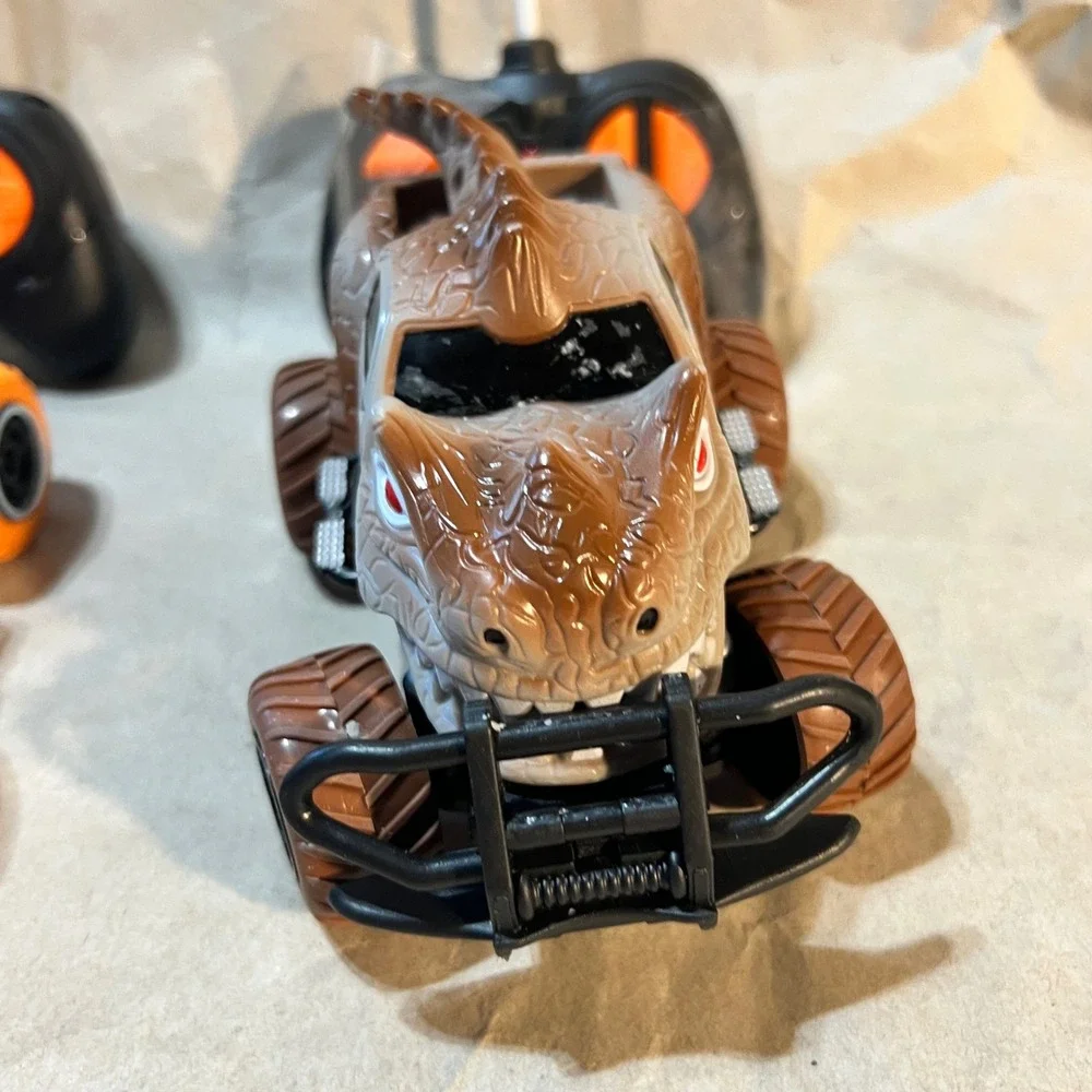RC Monster Truck Set Dinosaur & Off-Road Brown Black Orange 2 Pack